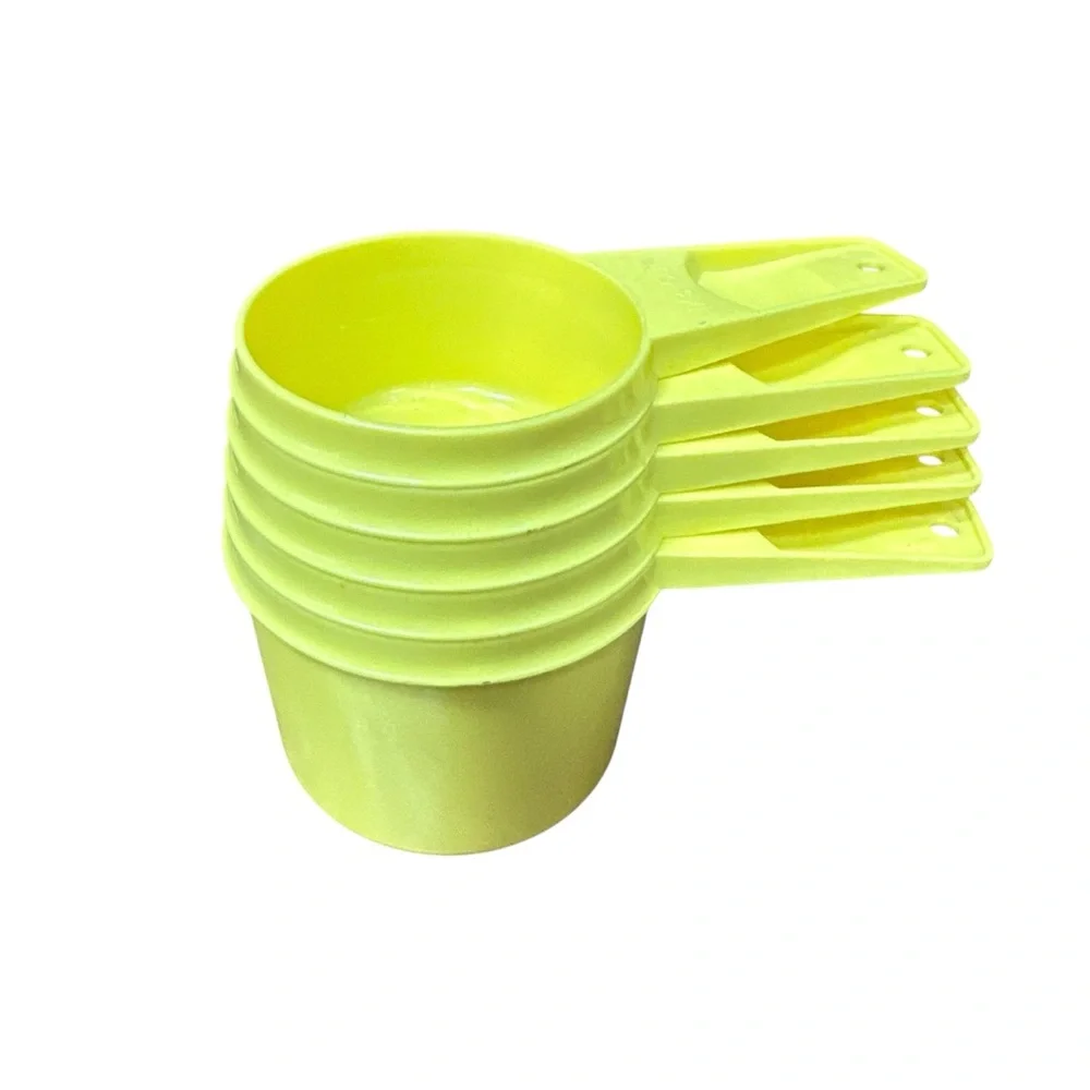 Vintage 70s Harvest Gold Yellow Stacking Measuring Cups - Set of 5
